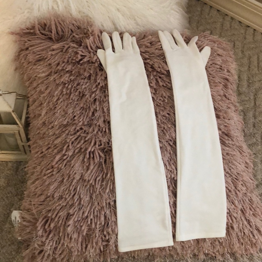 White,gently worn once, elbow length gloves.